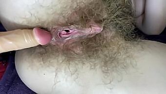 Hairy Girl Uses A Dildo To Stimulate Her Wet Pussy